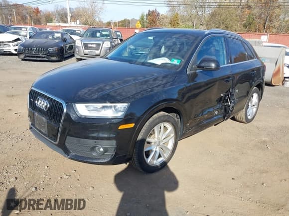 ✅ 2015 Audi Q3 Prestige • VIN: WA1GFCFS9FR004358 • Lot: 43604261. Listed on IAAI with 81,990 mi. Free auction sales archive from the USA and detailed vehicle history report at DreamBid. Image 2.