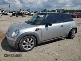 2007 MINI Hardtop with VIN WMWMF33597TT56851, listed as a Copart auction lot 68785325 with 140,683 mi miles and Salvage title. Bid and sale history available at DreamBid. Image 1.