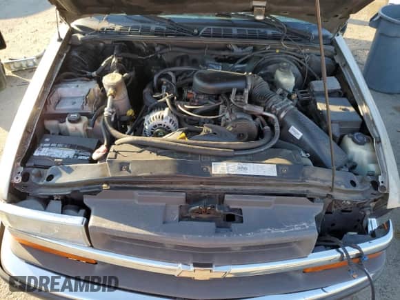 2001 Chevrolet Blazer LS с VIN 1GNCS13W71K244416, выставлен на аукционе Copart как лот 77312694 с пробегом 194 740 миль миль и Списание • Salvage title. История ставок и продаж доступна на DreamBid. Изображение 12.