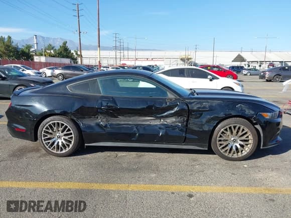 ✅ 2016 Ford Mustang V6 • VIN: 1FA6P8AM4G5284189 • Lot: 43599290. Listed on IAAI with 66,830 mi. Free auction sales archive from the USA and detailed vehicle history report at DreamBid. Image 13.