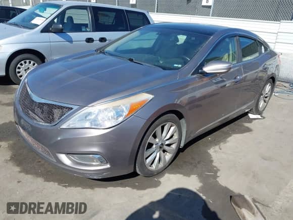 2013 Hyundai Azera с VIN KMHFH4JG9DA281474, выставлен на аукционе IAAI как лот 41881401 с пробегом 142 219 миль миль и . История ставок и продаж доступна на DreamBid. Изображение 2.