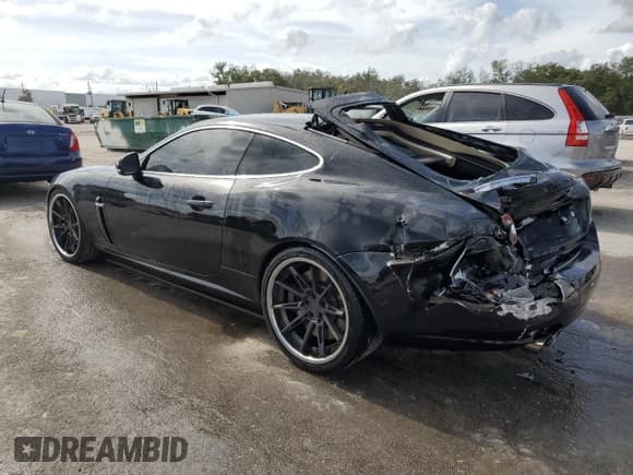 ✅ 2011 Jaguar XK XKR • VIN: SAJWA4DCXBMB39622 • Lot: 79881914. Listed on Copart with 61,163 mi. Free auction sales archive from the USA and detailed vehicle history report at DreamBid. Image 2.