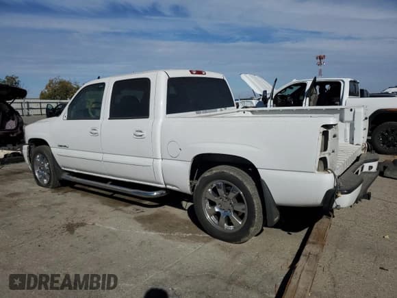 ✅ 2006 GMC Sierra Denali • VIN: 2GTEK63N161127525 • Lot: 86103495. Listed on Copart with 205,565 mi. Free auction sales archive from the USA and detailed vehicle history report at DreamBid. Image 2.