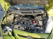 ✅ 2012 Ford Fiesta SE • VIN: 3FADP4EJXCM183694 • Lot: 82166405. Wystawiony na Copart z przebiegiem 118 055 mil. Bezpłatny archiwum sprzedaży aukcyjnych z USA i szczegółowy raport historii pojazdu na DreamBid. Zdjęcie 11.