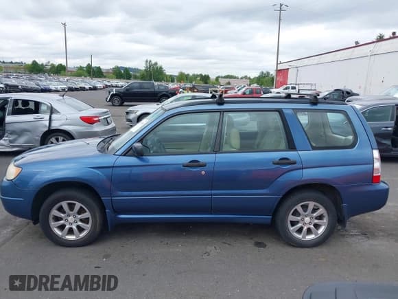 ✅ 2007 Subaru Forester X • VIN: JF1SG63657G743039 • Lot: 42136531. Listed on IAAI with 129,731 mi. Free auction sales archive from the USA and detailed vehicle history report at DreamBid. Image 13.