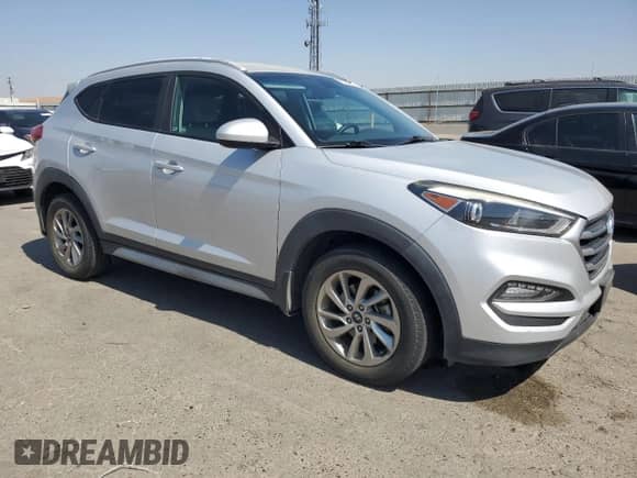 2018 Hyundai Tucson SEL with VIN KM8J33A49JU696698, listed as a Copart auction lot 81082295 with 100,669 mi miles and Salvage title. Bid and sale history available at DreamBid. Image 4.