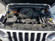 ✅ 2021 Jeep Wrangler Unlimited Sahara • VIN: 1C4JJXP63MW720948 • Lot: 57115825. Listed on Copart with 33,391 mi. Free auction sales archive from the USA and detailed vehicle history report at DreamBid. Image 12.