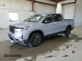 ✅ 2023 Honda Ridgeline Sport • VIN: 5FPYK3F15PB046988 • Lot: 84390575. Listed on Copart with 59,254 mi. Free auction sales archive from the USA and detailed vehicle history report at DreamBid. Image 1.