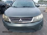 ✅ 2008 Mitsubishi Outlander SE • VIN: JA4LS31W58Z010939 • Lot: 43808076. Listed on IAAI with 220,661 mi. Free auction sales archive from the USA and detailed vehicle history report at DreamBid. Image 6.