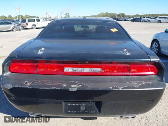 2012 Dodge Challenger SXT Plus with VIN 2C3CDYAG6CH176860, listed as a IAAI auction lot 43584841 with Not provided miles and . Bid and sale history available at DreamBid. Image 16.