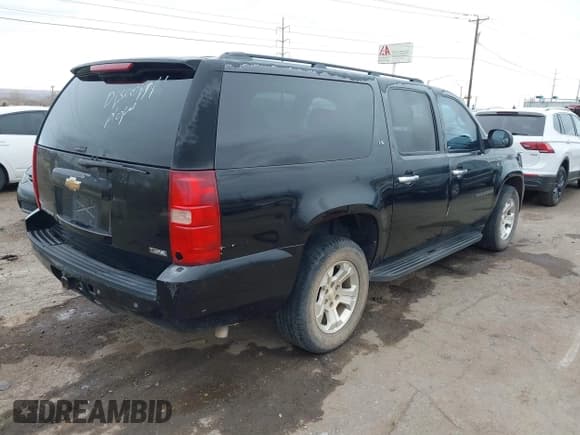 ✅ 2007 Chevrolet Suburban LTZ • VIN: 1GNFC16007J317898 • Lot: 41560031. Listed on IAAI with 271,370 mi. Free auction sales archive from the USA and detailed vehicle history report at DreamBid. Image 4.