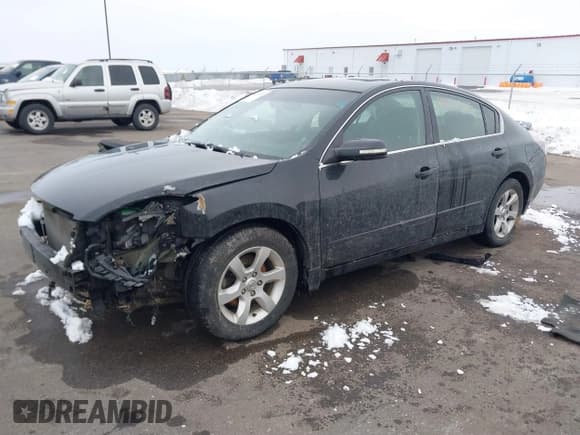 ✅ 2007 Nissan Altima SE • VIN: 1N4BL21E57C174246 • Lot: 41134325. Wystawiony na IAAI z przebiegiem 188 067 mil. Bezpłatny archiwum sprzedaży aukcyjnych z USA i szczegółowy raport historii pojazdu na DreamBid. Zdjęcie 18.