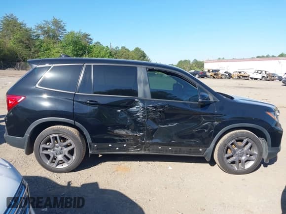 ✅ 2022 Honda Passport EX-L • VIN: 5FNYF7H57NB004890 • Lot: 42032854. Listed on IAAI with 53,642 mi. Free auction sales archive from the USA and detailed vehicle history report at DreamBid. Image 13.