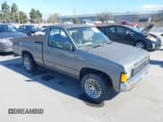 ✅ 1988 Nissan Hardbody • VIN: 1N6ND11S0JC345025 • Lot: 41899460. Wystawiony na IAAI z przebiegiem 132 502 mil. Bezpłatny archiwum sprzedaży aukcyjnych z USA i szczegółowy raport historii pojazdu na DreamBid. Zdjęcie 1.