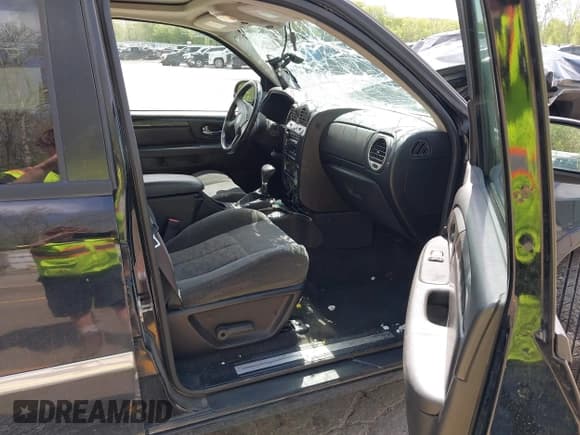 ✅ 2006 GMC Envoy SLE • VIN: 1GKDT13S562240769 • Lot: 42255973. Listed on IAAI with 183,423 mi. Free auction sales archive from the USA and detailed vehicle history report at DreamBid. Image 5.