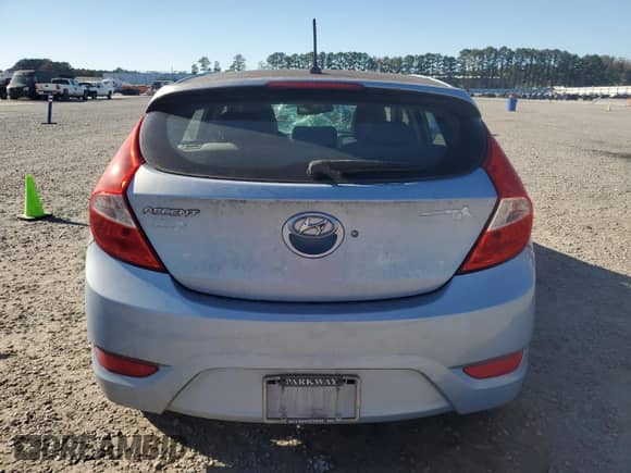 2012 Hyundai Accent SE with VIN KMHCU5AE3CU043488, listed as a Copart auction lot 87283305 with 136,528 mi miles and Salvage title. Bid and sale history available at DreamBid. Image 6.