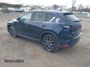 ✅ 2018 Mazda CX-5 Grand Touring • VIN: JM3KFBDM2J0468708 • Лот: 43571543. Опубликован ранее на IAAI с пробегом 210 942 миль. Бесплатный доступ к архиву аукционных продаж из США и подробный отчёт об истории автомобиля на DreamBid. Изображение 3.