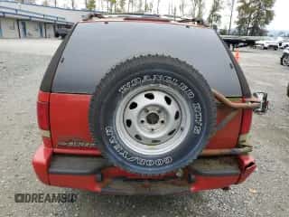 2000 Chevrolet Blazer LS z VIN 1GNCT18W5YK210040, wystawiony jako Copart lot #73253404 z przebiegiem Nie podano mil oraz Czysty tytuł • Clean title. Historia ofert i sprzedaży dostępna na DreamBid. Obrazek 6.