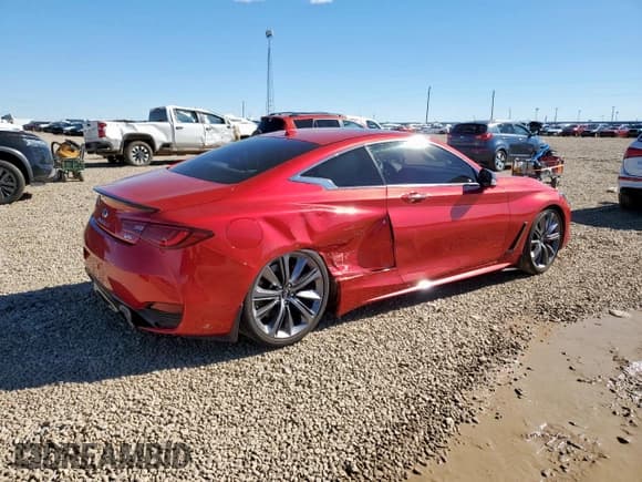 ✅ 2022 Infiniti Q60 Red Sport 400 • VIN: JN1FV7LK8NM660520 • Lot: 90478675. Listed on Copart with 9,916 mi. Free auction sales archive from the USA and detailed vehicle history report at DreamBid. Image 3.