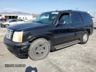 ✅ 2002 Cadillac Escalade • VIN: 1GYEC63TX2R287491 • Lot: 70866575. Wystawiony na Copart z przebiegiem 195 047 mil. Bezpłatny archiwum sprzedaży aukcyjnych z USA i szczegółowy raport historii pojazdu na DreamBid. Zdjęcie 1.