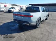 ✅ 2024 Rivian R1T Adventure • VIN: 7FCTGAAA5RN033799 • Лот: 41606562. Опубликован ранее на IAAI с пробегом 9 449 миль. Бесплатный доступ к архиву аукционных продаж из США и подробный отчёт об истории автомобиля на DreamBid. Изображение 4.