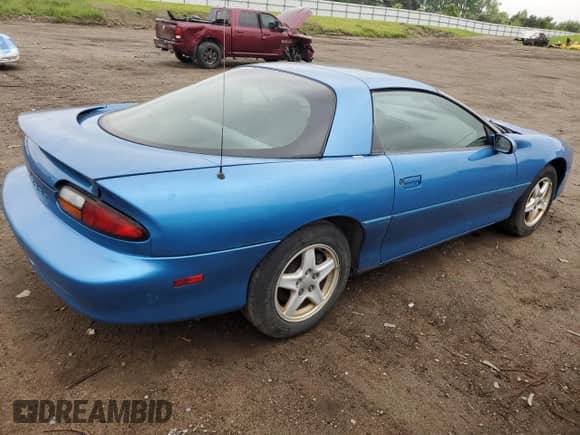 1999 Chevrolet Camaro z VIN 2G1FP22K4X2114553, wystawiony jako Copart lot #58664935 z przebiegiem 147 118 mil mil oraz Czysty tytuł • Clean title. Historia ofert i sprzedaży dostępna na DreamBid. Obrazek 3.