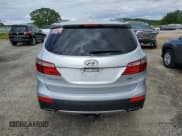 ✅ 2014 Hyundai Santa Fe Limited • VIN: KM8SR4HF5EU083306 • Лот: 57978085. Опубликован ранее на Copart с пробегом 110 553 миль. Бесплатный доступ к архиву аукционных продаж из США и подробный отчёт об истории автомобиля на DreamBid. Изображение 6.