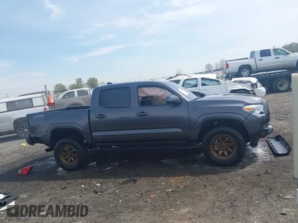 ✅ 2023 Toyota Tacoma SR • VIN: 3TYCZ5AN5PT144908 • Lot: 41888100. Listed on IAAI with 21,894 mi. Free auction sales archive from the USA and detailed vehicle history report at DreamBid. Image 13.