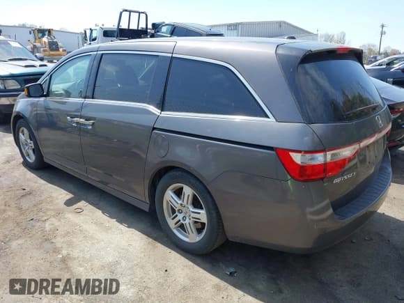 ✅ 2012 Honda Odyssey Touring • VIN: 5FNRL5H92CB116899 • Lot: 41907863. Listed on IAAI with 225,221 mi. Free auction sales archive from the USA and detailed vehicle history report at DreamBid. Image 3.