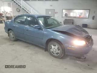 1999 Chevrolet Malibu with VIN 1G1ND52T2X6221114, listed as a Copart auction lot 80739084 with 128,323 mi miles and Salvage title. Bid and sale history available at DreamBid. Image 4.