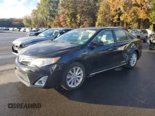 ✅ 2012 Toyota Camry XLE • VIN: 4T1BD1FK5CU025206 • Lot: 87071075. Listed on Copart with 120,068 mi. Free auction sales archive from the USA and detailed vehicle history report at DreamBid. Image 1.