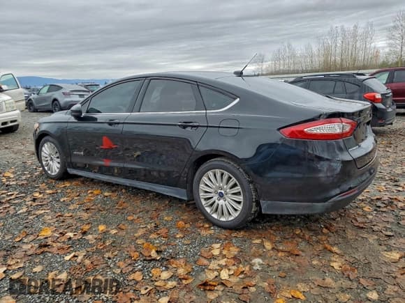 ✅ 2016 Ford Fusion S Hybrid • VIN: 3FA6P0UU1GR118805 • Lot: 93336205. Wystawiony na Copart z przebiegiem 141 238 mil. Bezpłatny archiwum sprzedaży aukcyjnych z USA i szczegółowy raport historii pojazdu na DreamBid. Zdjęcie 2.