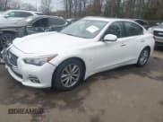 ✅ 2014 Infiniti Q50 Premium • VIN: JN1BV7AR7EM692504 • Lot: 43789438. Listed on IAAI with 104,772 mi. Free auction sales archive from the USA and detailed vehicle history report at DreamBid. Image 2.