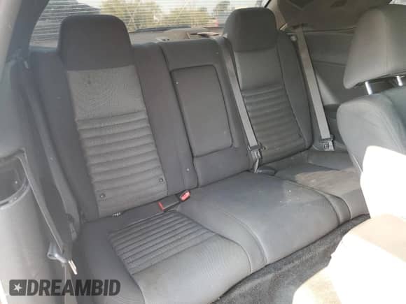 2013 Dodge Challenger SXT z VIN 2C3CDYAG1DH649372, wystawiony jako Copart lot #65924934 z przebiegiem 169 588 mil mil oraz Szkoda całkowita • Salvage title. Historia ofert i sprzedaży dostępna na DreamBid. Obrazek 10.