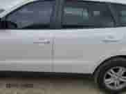 2012 Hyundai Santa Fe GLS with VIN 5XYZG3ABXCG113666, listed as a Copart auction lot 74131604 with 121,303 mi miles and Salvage title. Bid and sale history available at DreamBid. Image 13.