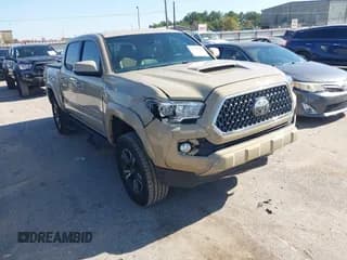 ✅ 2019 Toyota Tacoma TRD Sport • VIN: 3TMAZ5CN7KM086924 • Lot: 43920420. Listed on IAAI with 122,979 mi. Free auction sales archive from the USA and detailed vehicle history report at DreamBid. Image 1.