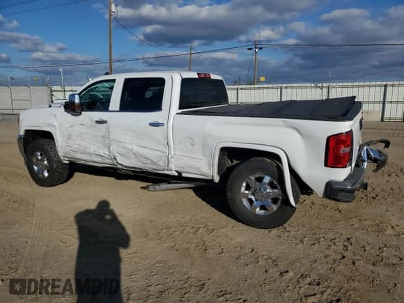 ✅ 2018 GMC Sierra 2500HD SLT • VIN: 1GT12TEY7JF148546 • Lot: 91048265. Listed on Copart with 95,759 mi. Free auction sales archive from the USA and detailed vehicle history report at DreamBid. Image 2.