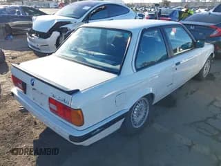 ✅ 1989 BMW 3 Series • VIN: WBAAA1301K4143020 • Lot: 41824191. Listed on IAAI with 162,399 mi. Free auction sales archive from the USA and detailed vehicle history report at DreamBid. Image 4.