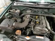 ✅ 2002 Suzuki Vitara JLX • VIN: 2S3TD52V126103138 • Лот: 86304474. Опубликован ранее на Copart с пробегом 135 833 миль. Бесплатный доступ к архиву аукционных продаж из США и подробный отчёт об истории автомобиля на DreamBid. Изображение 15.