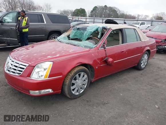 ✅ 2008 Cadillac DTS 1SC • VIN: 1G6KD57Y78U190232 • Lot: 41502050. Listed on IAAI with 129,804 mi. Free auction sales archive from the USA and detailed vehicle history report at DreamBid. Image 2.