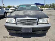 ✅ 2000 Mercedes-Benz C 230/260/280/320 • VIN: WDBHA29G1YA865169 • Lot: 64120844. Wystawiony na Copart z przebiegiem Nie podano. Bezpłatny archiwum sprzedaży aukcyjnych z USA i szczegółowy raport historii pojazdu na DreamBid. Zdjęcie 5.
