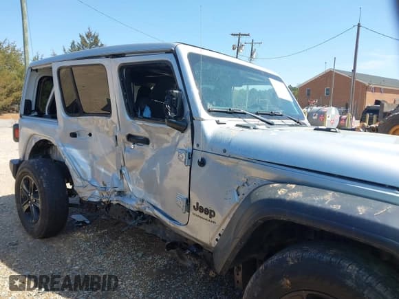 ✅ 2023 Jeep Wrangler Sport • VIN: 1C4HJXDG0PW582947 • Lot: 41932930. Listed on IAAI with 19,670 mi. Free auction sales archive from the USA and detailed vehicle history report at DreamBid. Image 13.