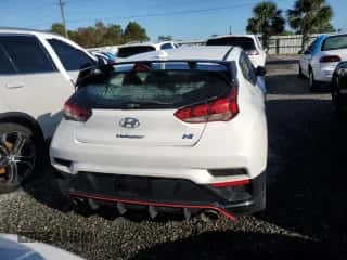 2021 Hyundai Veloster z VIN KMHT36AH6MU010330, wystawiony jako Copart lot #74517604 z przebiegiem Nie podano mil oraz Nie do naprawy • Non repairable. Historia ofert i sprzedaży dostępna na DreamBid. Obrazek 6.