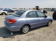 ✅ 2003 Kia Rio • VIN: KNADC125336204930 • Лот: 71482095. Опубликован ранее на Copart с пробегом 163 361 миль. Бесплатный доступ к архиву аукционных продаж из США и подробный отчёт об истории автомобиля на DreamBid. Изображение 3.