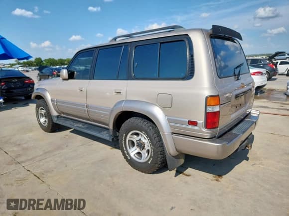 ✅ 1997 Lexus LX 450 • VIN: JT6HJ88JXV0185846 • Lot: 68550005. Wystawiony na Copart z przebiegiem 164 025 mil. Bezpłatny archiwum sprzedaży aukcyjnych z USA i szczegółowy raport historii pojazdu na DreamBid. Zdjęcie 2.
