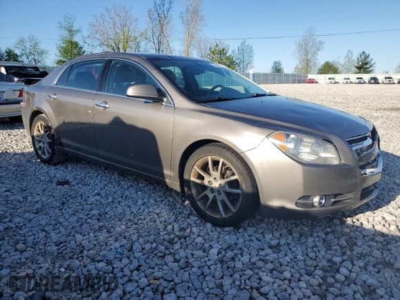 ✅ 2011 Chevrolet Malibu LTZ • VIN: 1G1ZE5E10BF239810 • Lot: 73919904. Listed on Copart with 271,307 mi. Free auction sales archive from the USA and detailed vehicle history report at DreamBid. Image 4.