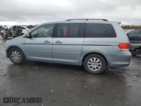 ✅ 2009 Honda Odyssey EX-L • VIN: 5FNRL38749B031641 • Lot: 90673625. Wystawiony na Copart z przebiegiem 223 791 mil. Bezpłatny archiwum sprzedaży aukcyjnych z USA i szczegółowy raport historii pojazdu na DreamBid. Zdjęcie 2.