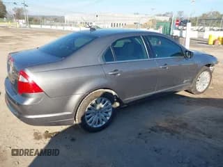 ✅ 2010 Ford Fusion Hybrid • VIN: 3FADP0L37AR309121 • Lot: 43598523. Wystawiony na IAAI z przebiegiem 183 997 mil. Bezpłatny archiwum sprzedaży aukcyjnych z USA i szczegółowy raport historii pojazdu na DreamBid. Zdjęcie 4.