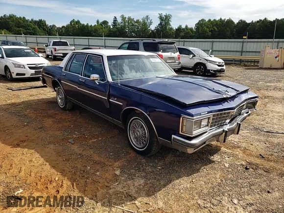 ✅ 1985 Oldsmobile Delta • VIN: 1G3BY69Y2FY379333 • Лот: 68540105. Опубликован ранее на Copart с пробегом 76 044 миль. Бесплатный доступ к архиву аукционных продаж из США и подробный отчёт об истории автомобиля на DreamBid. Изображение 13.