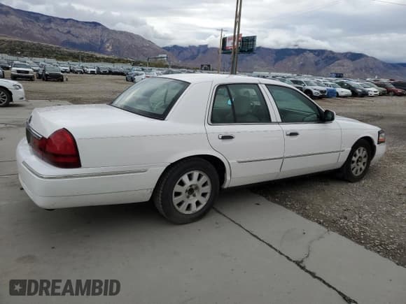 ✅ 2003 Mercury Grand Marquis LS Premium • VIN: 2MEFM75W03X698022 • Lot: 90296825. Listed on Copart with 114,903 mi. Free auction sales archive from the USA and detailed vehicle history report at DreamBid. Image 3.